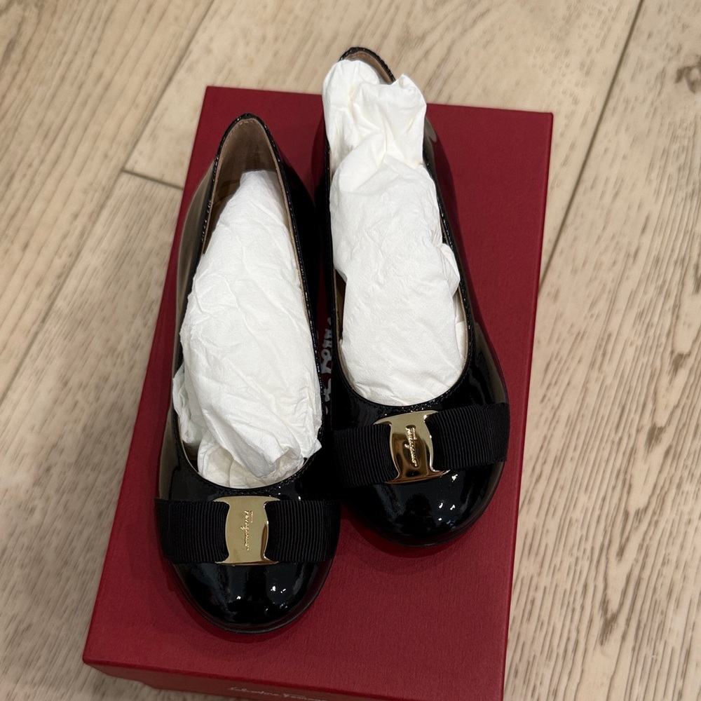 Salvatore Ferragamo Black Patent Leather Flats with Gold Accent